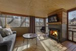 Guest House Screened Porch with Wood Fireplace